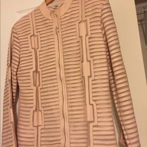 A pink jacket , faux leather , made in Paris